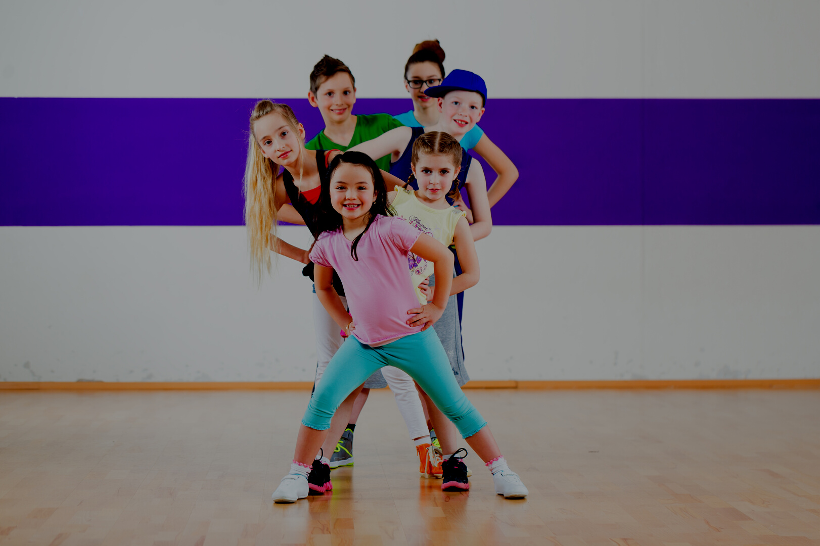 Kids Train Zumba Fitness in Dancing School
