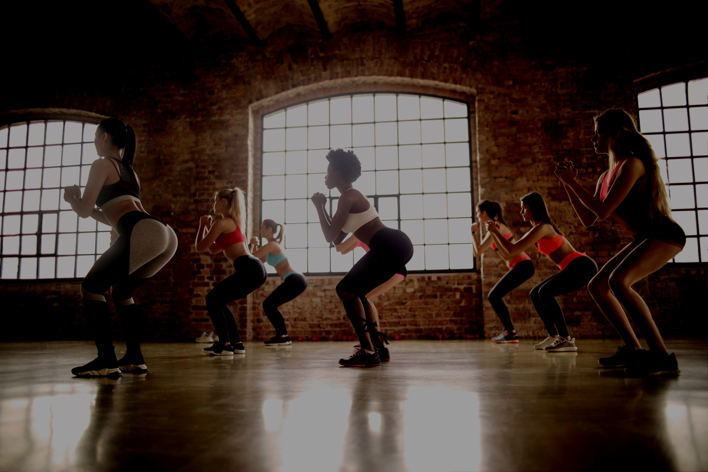 Group of Women Doing Exercise Inside The Building